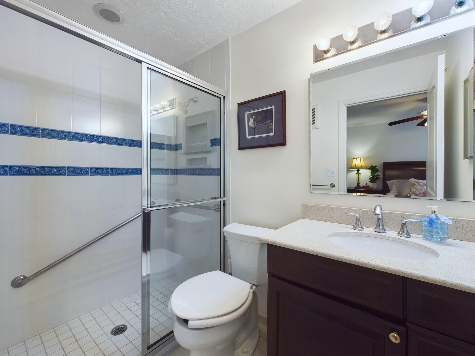 7667 North Wickham Road, Unit 1308 Melbourne, FL 32940 - Photo 21 of 56 a bathroom with a sink toilet and shower