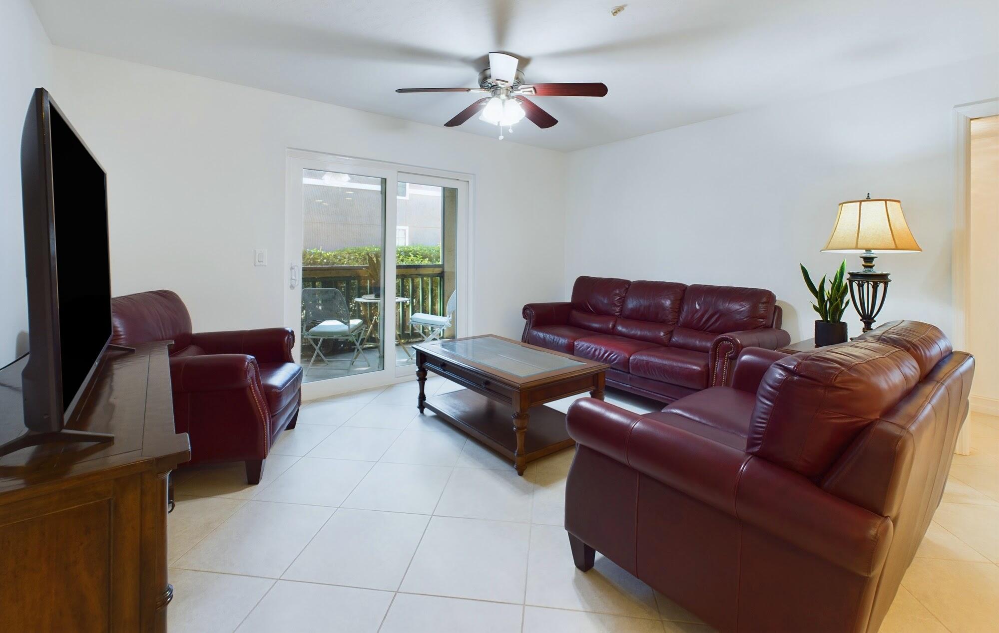 7667 North Wickham Road, Unit 1308 Melbourne, FL 32940 - Photo 26 of 56 a living room with furniture