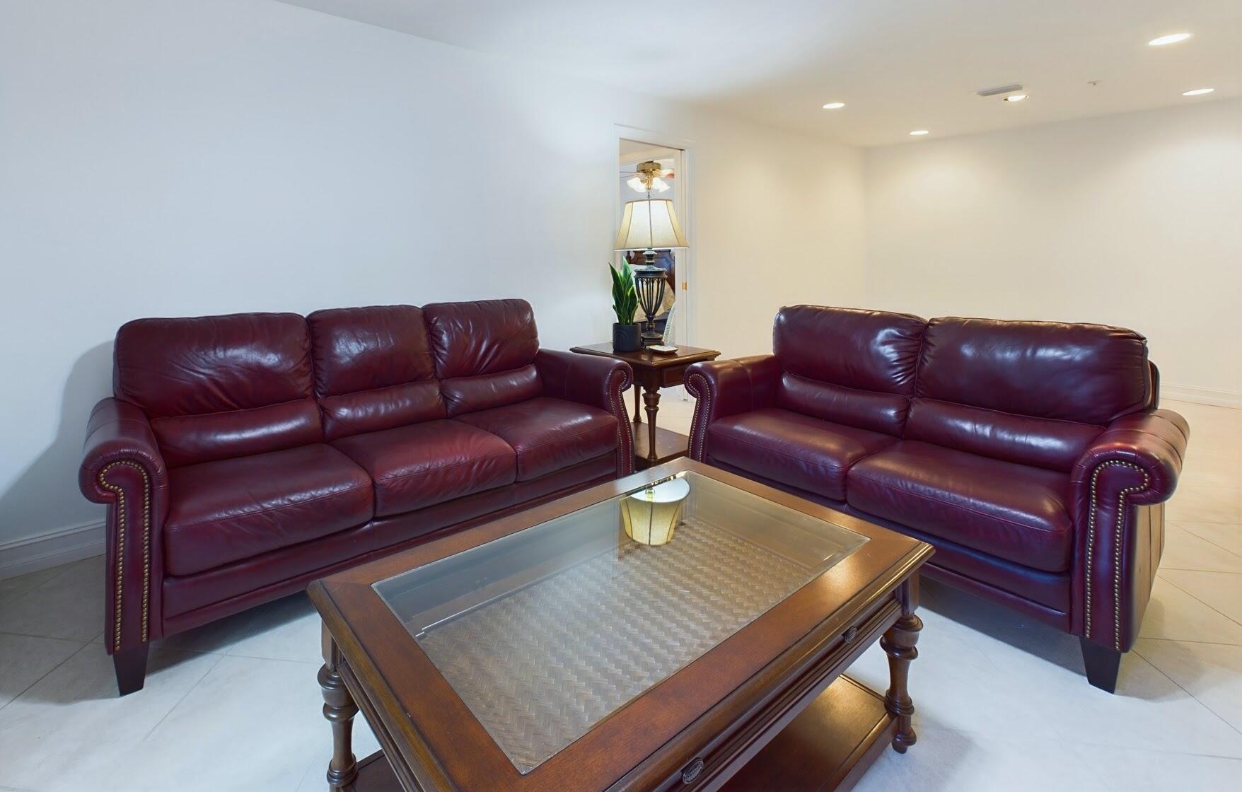 7667 North Wickham Road, Unit 1308 Melbourne, FL 32940 - Photo 28 of 56 a living room with furniture