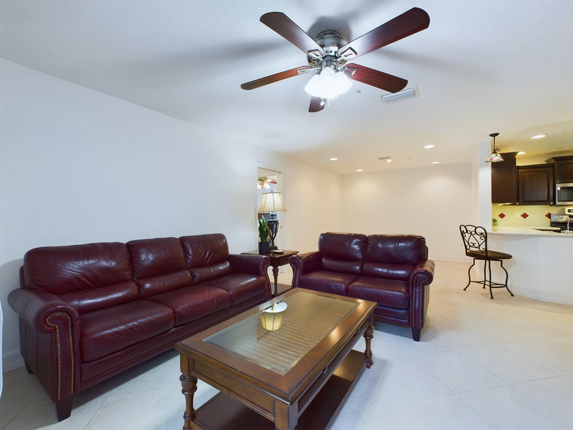 7667 North Wickham Road, Unit 1308 Melbourne, FL 32940 - Photo 30 of 56 a living room with furniture