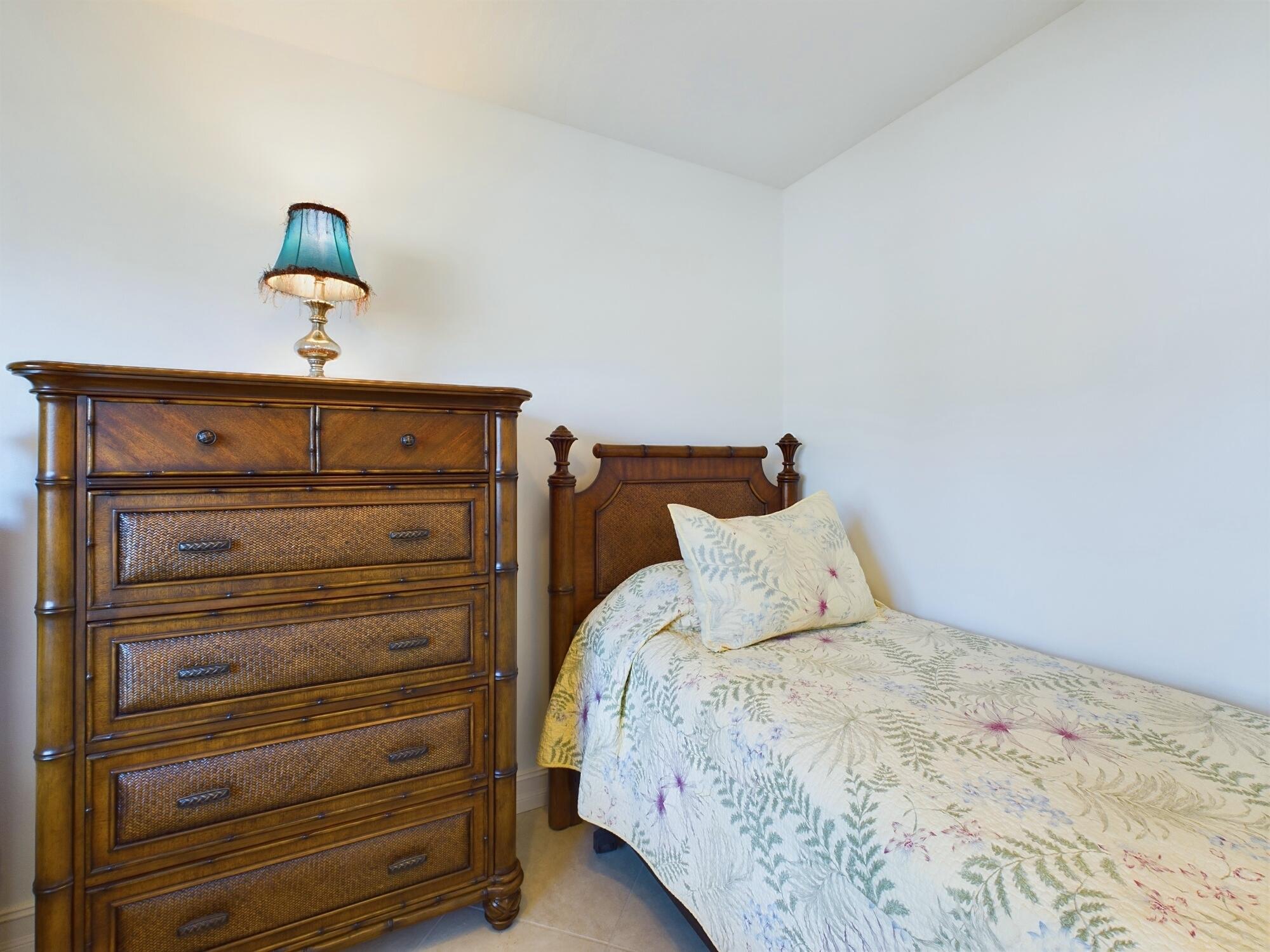 7667 North Wickham Road, Unit 1308 Melbourne, FL 32940 - Photo 36 of 56 a bedroom with a bed and a window