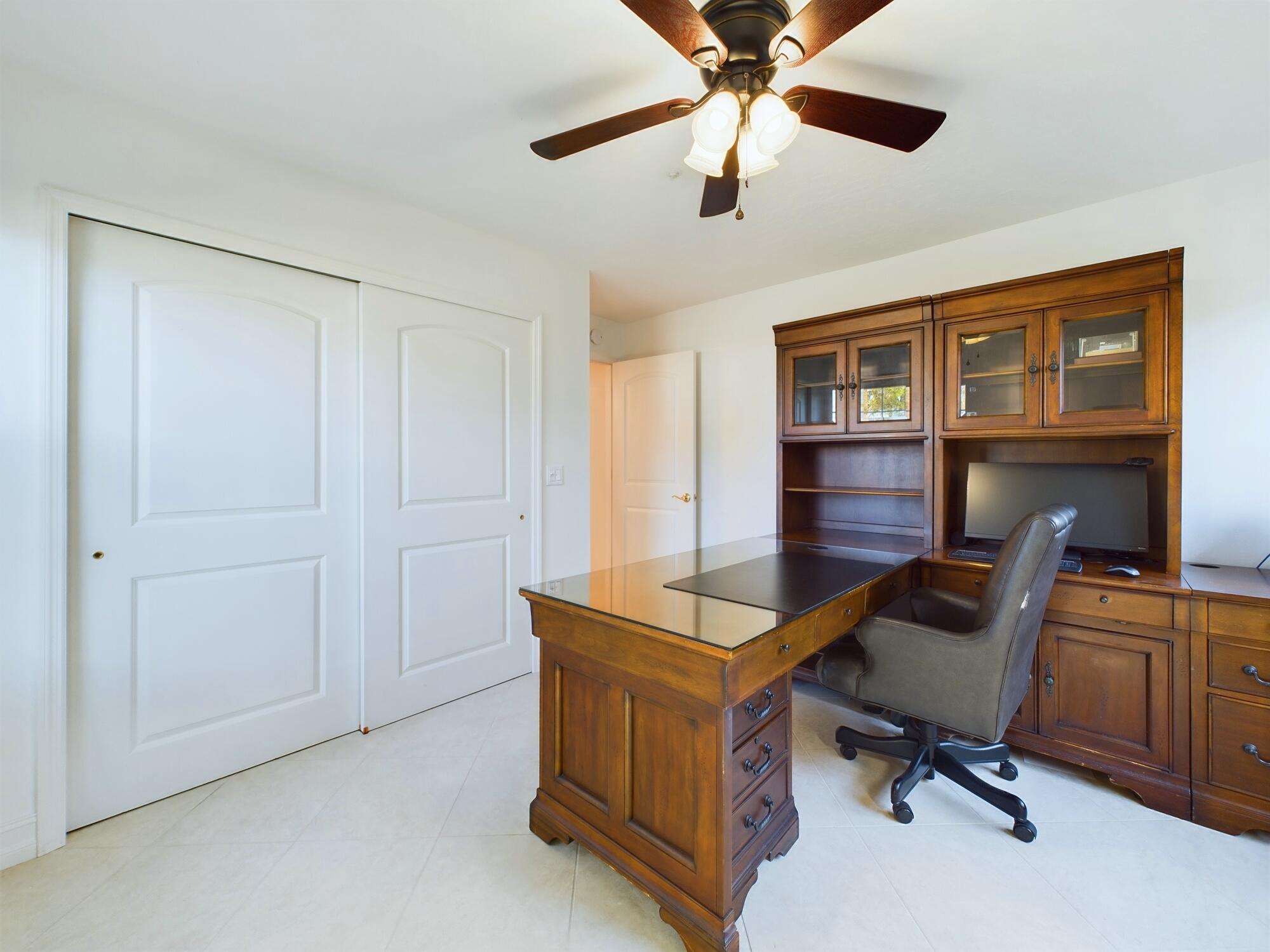 7667 North Wickham Road, Unit 1308 Melbourne, FL 32940 - Photo 47 of 56 a view of a workspace with furniture