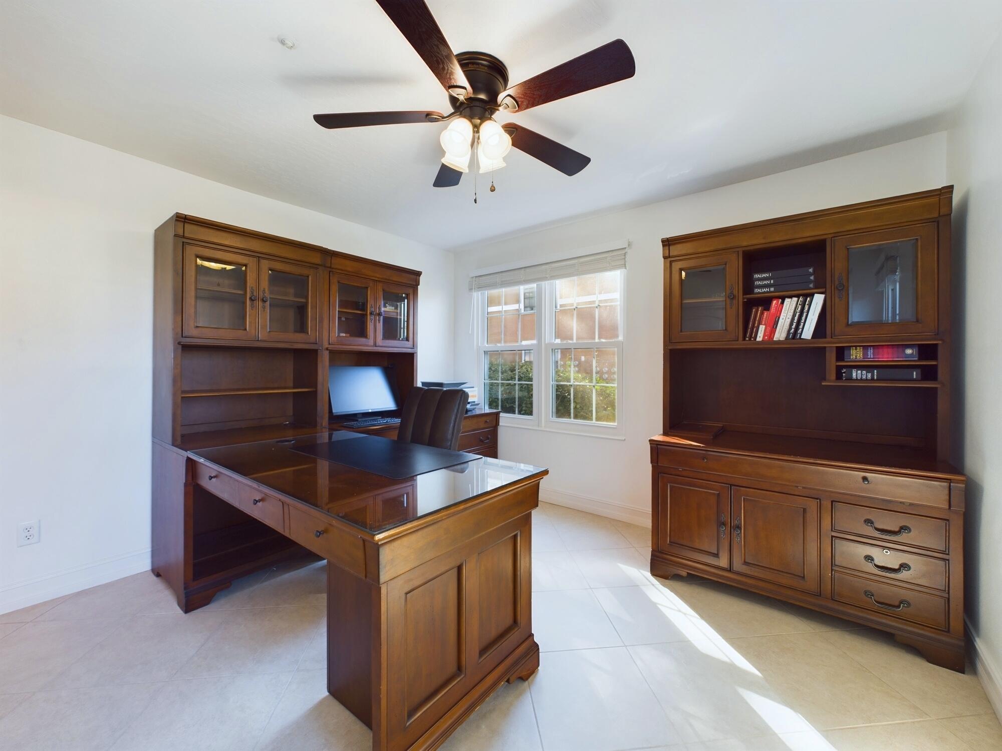 7667 North Wickham Road, Unit 1308 Melbourne, FL 32940 - Photo 48 of 56 a living room with furniture and wooden floor