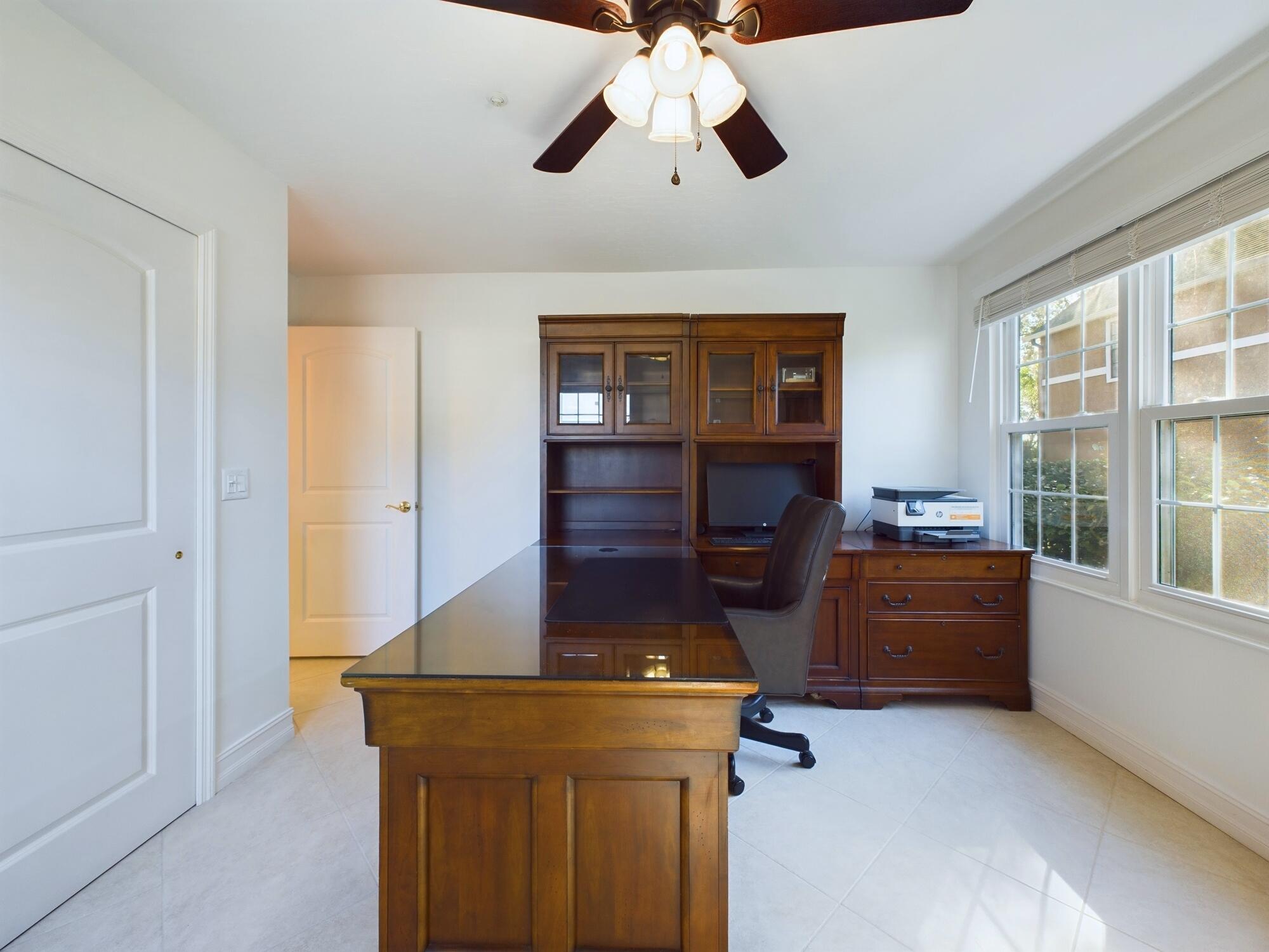7667 North Wickham Road, Unit 1308 Melbourne, FL 32940 - Photo 50 of 56 a room with furniture and windows