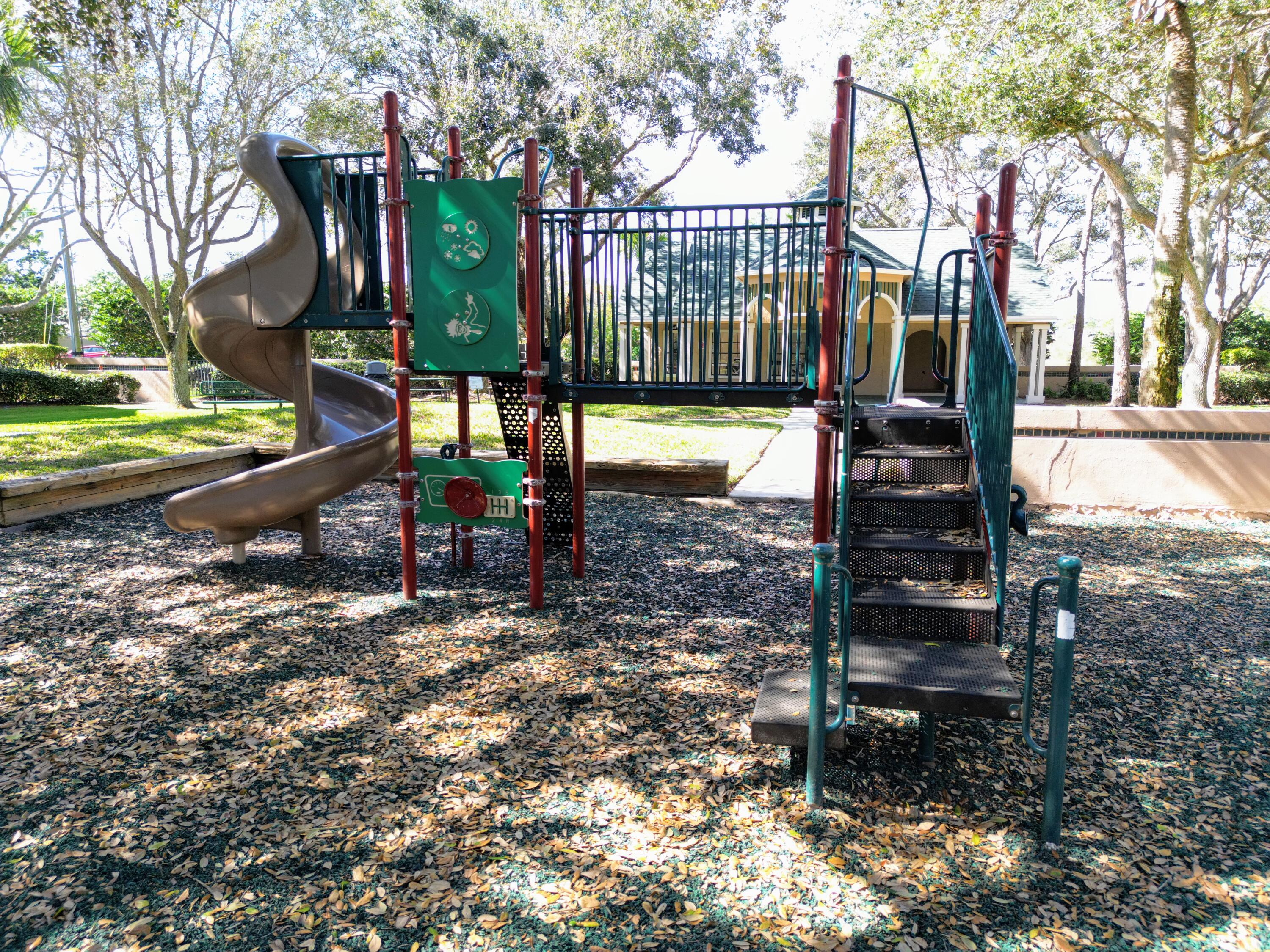 7667 North Wickham Road, Unit 1308 Melbourne, FL 32940 - Photo 55 of 56 a view of a park with iron fence