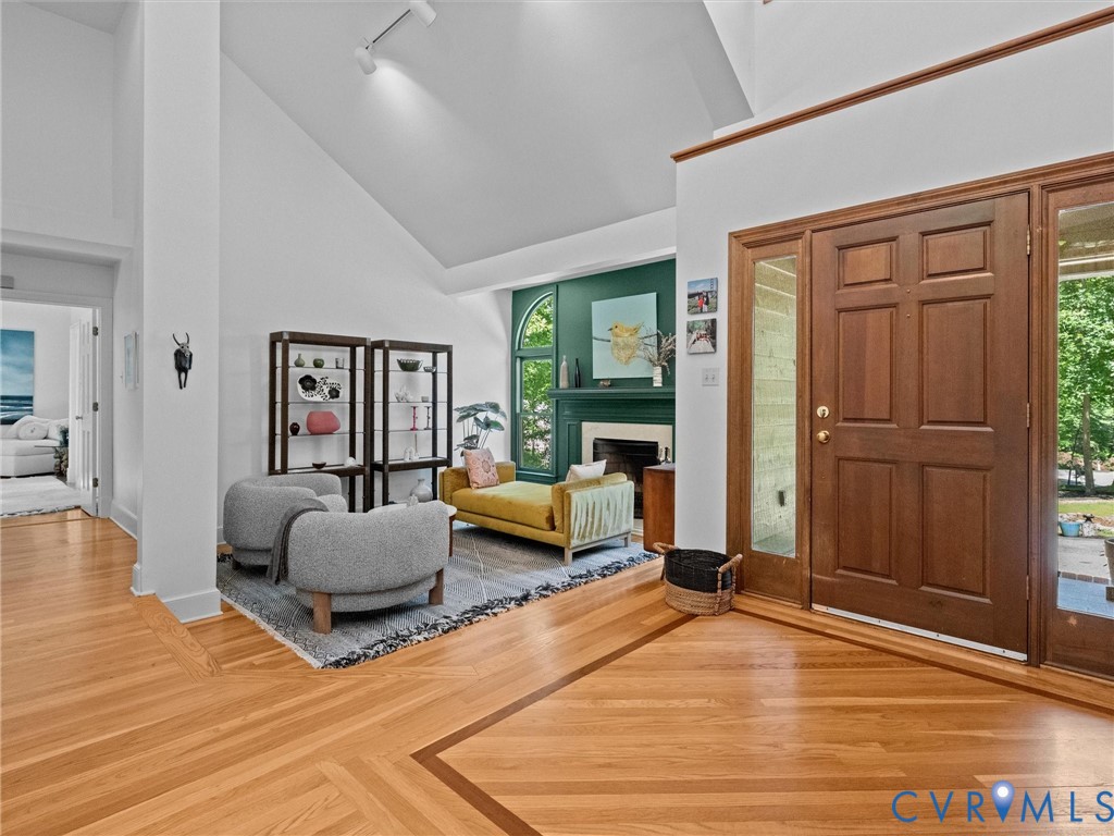 3201 St Stephens Way Midlothian, VA 23113 - Photo 5 of 72 a living room with furniture and a wooden floor