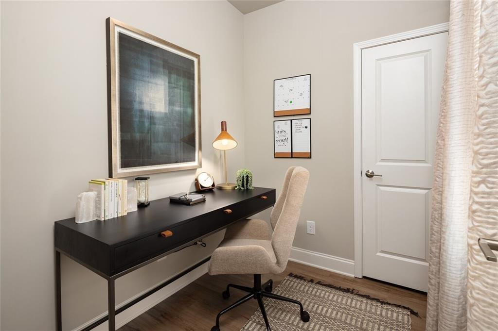 3960 Redan Road, Unit B2 Stone Mountain, GA 30083 - Photo 9 of 23 a room with table and chair
