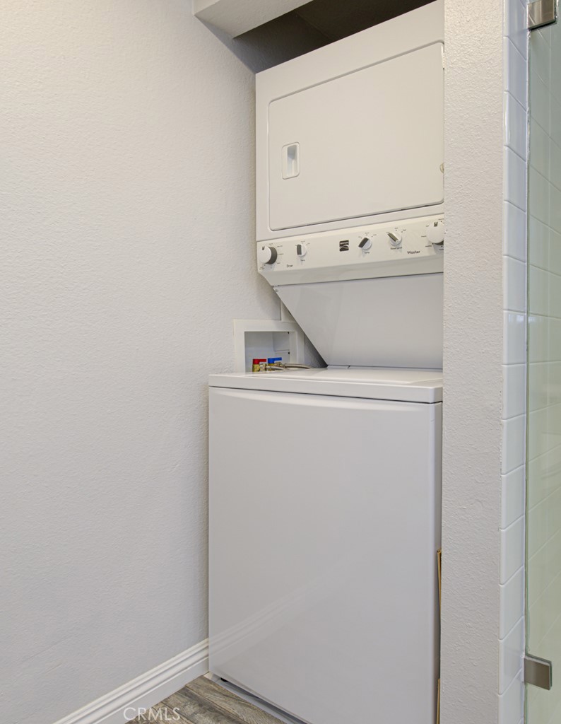 245 Calle Aragon, Unit C Laguna Woods, CA 92637 - Photo 22 of 32 a utility room with dryer and washer
