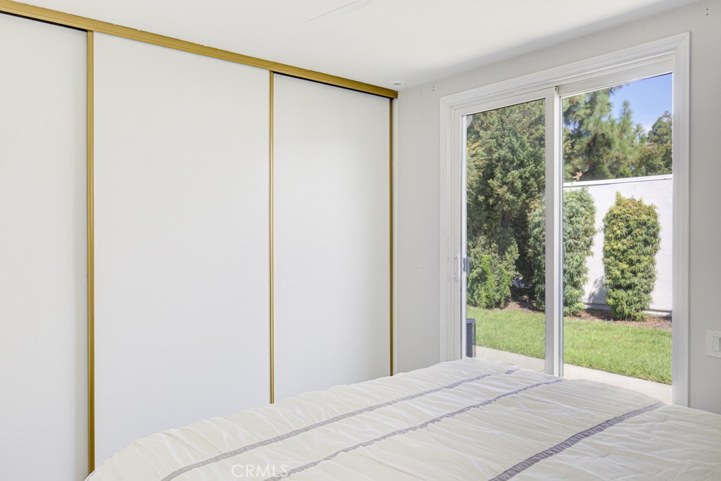 245 Calle Aragon, Unit C Laguna Woods, CA 92637 - Photo 25 of 32 a view of an empty room with a window