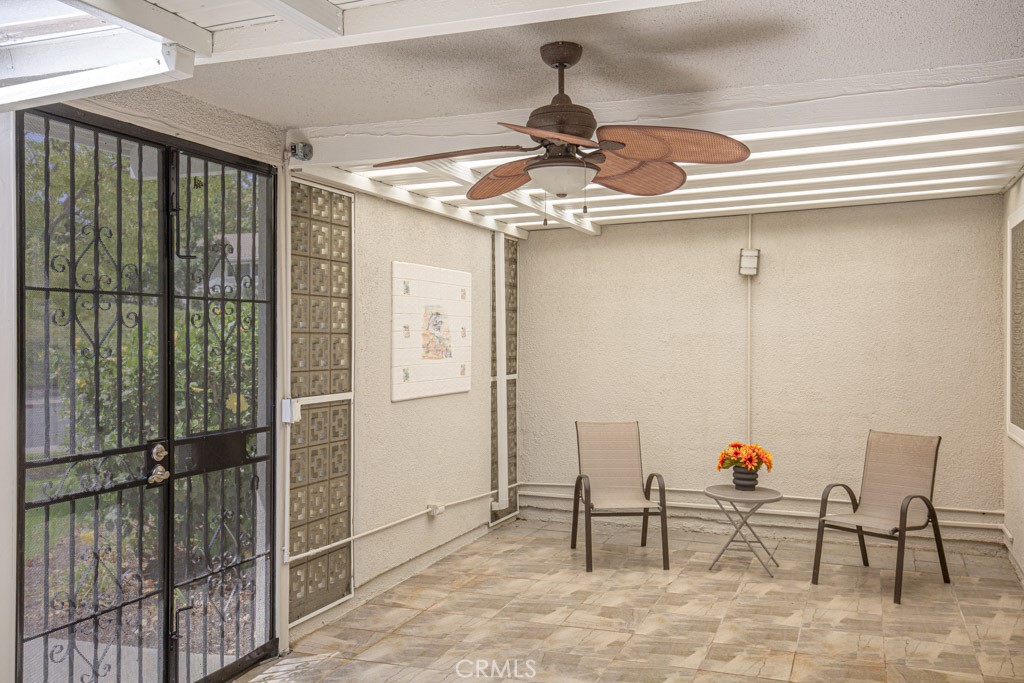 245 Calle Aragon, Unit C Laguna Woods, CA 92637 - Photo 29 of 32 a view of a livingroom with furniture and furniture