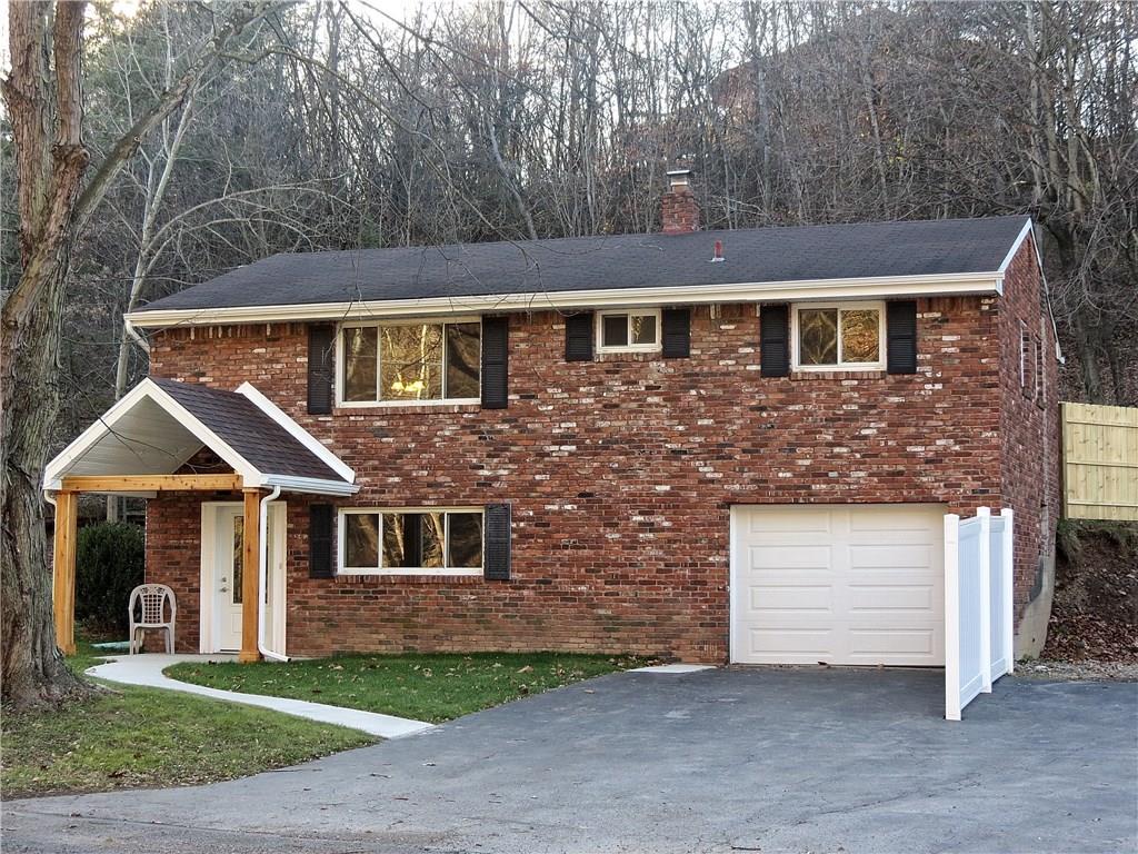 Beautiful & quality workmanship throughout this 3 bedroom ranch style all brick home! 