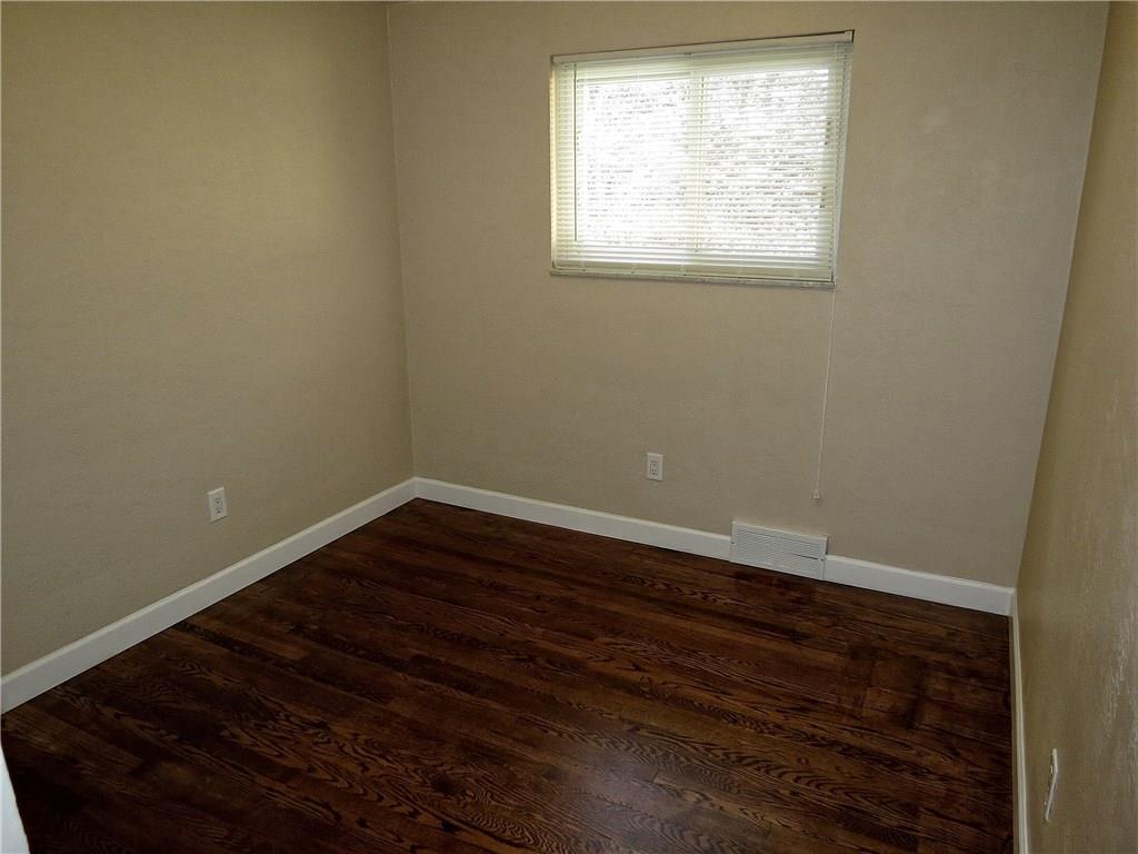 551 Chapel Road Aliquippa, PA 15001 - Photo 11 of 19 This 9.5 X 9 bedroom includes beautiful walnut stained hardwood floors.