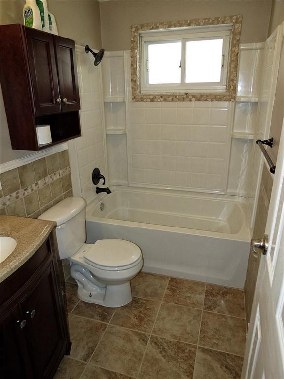 551 Chapel Road Aliquippa, PA 15001 - Photo 12 of 19 This all new ceramic tile bath includes rustic stone accents & cherry wood fixtures.