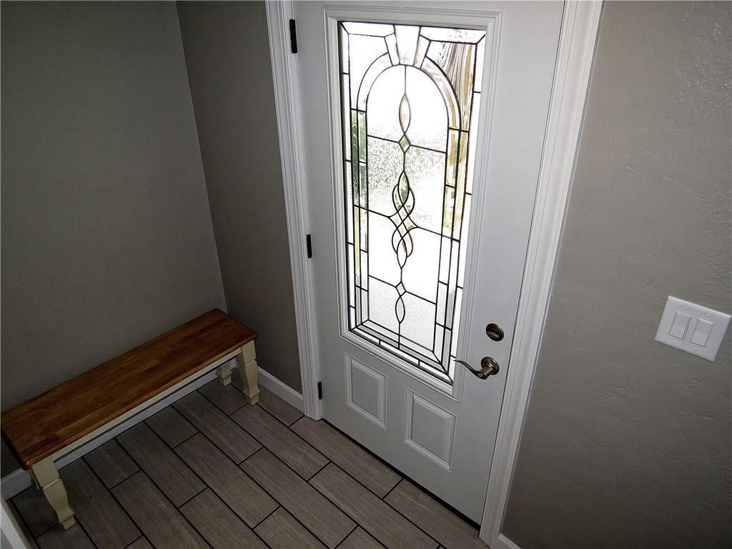 551 Chapel Road Aliquippa, PA 15001 - Photo 13 of 19 A welcoming foyer boasts ceramic tile flooring & ornately designed glass door.