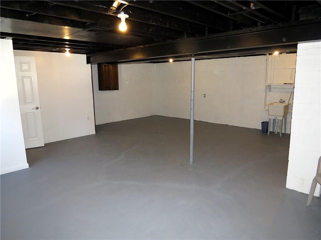 551 Chapel Road Aliquippa, PA 15001 - Photo 14 of 19 The large unfinished basement is spotless - ready for you to make it your special space!