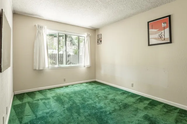 a view of an empty room with window