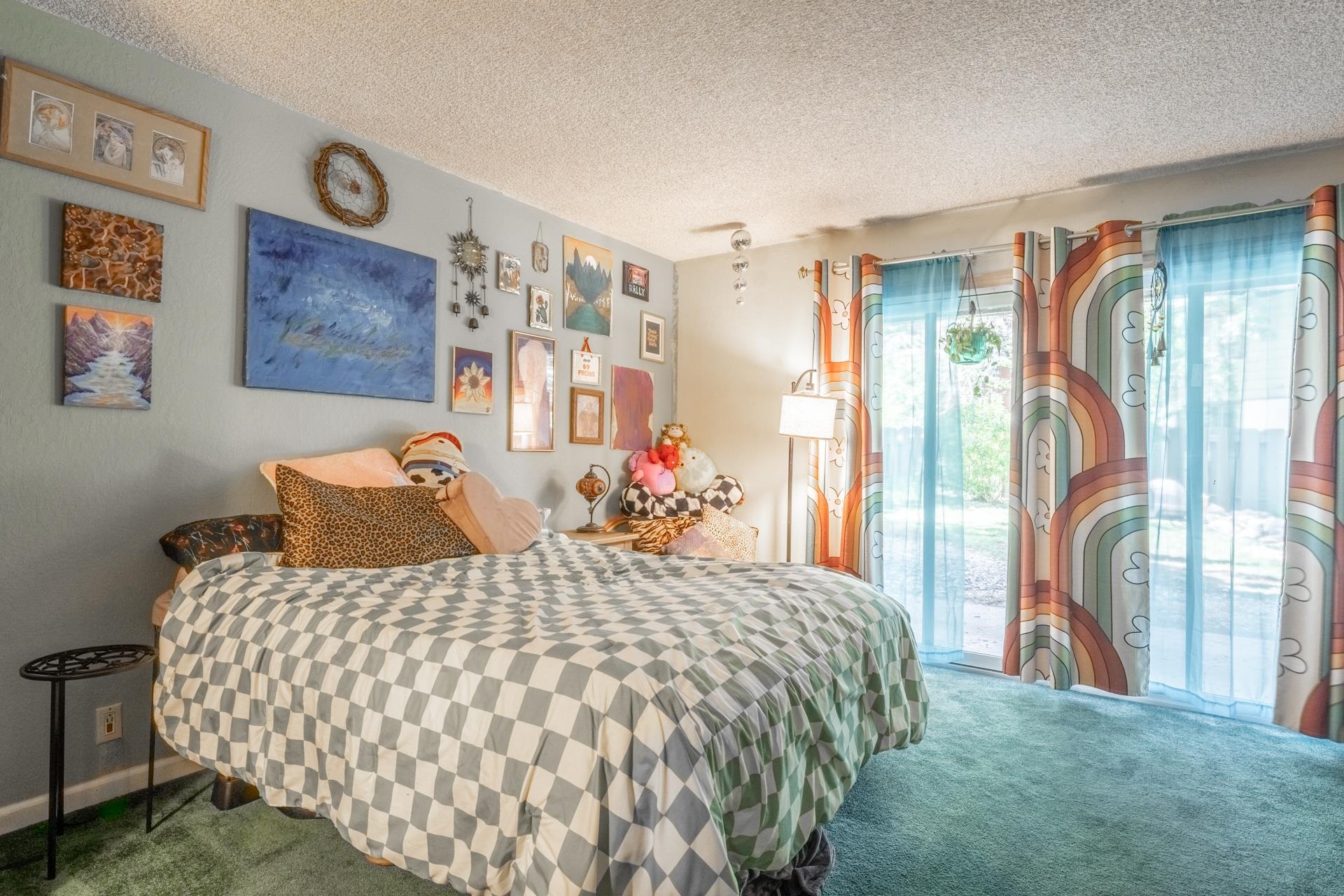 3251 Chateau Road, Unit 38 Mammoth Lakes, CA 93546 - Photo 23 of 50 a bedroom with a large bed and a chandelier