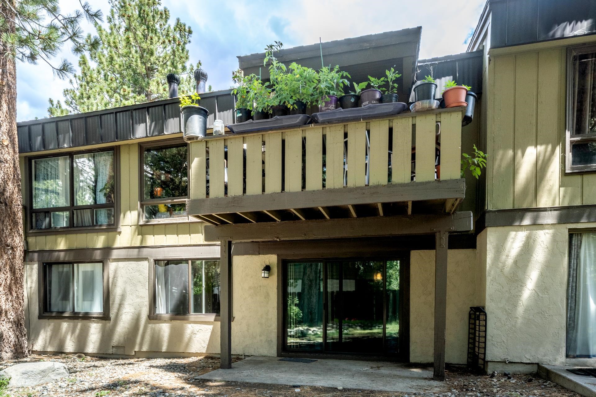 3251 Chateau Road, Unit 38 Mammoth Lakes, CA 93546 - Photo 36 of 50 a front view of a house with a porch