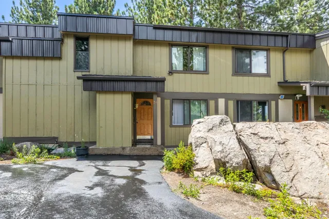 a front view of a house having yard