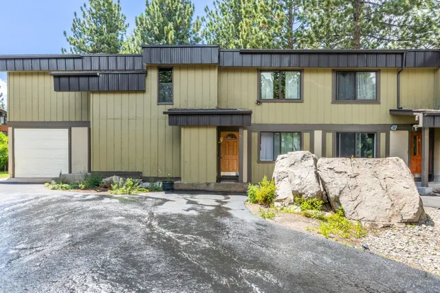 a front view of a house having yard
