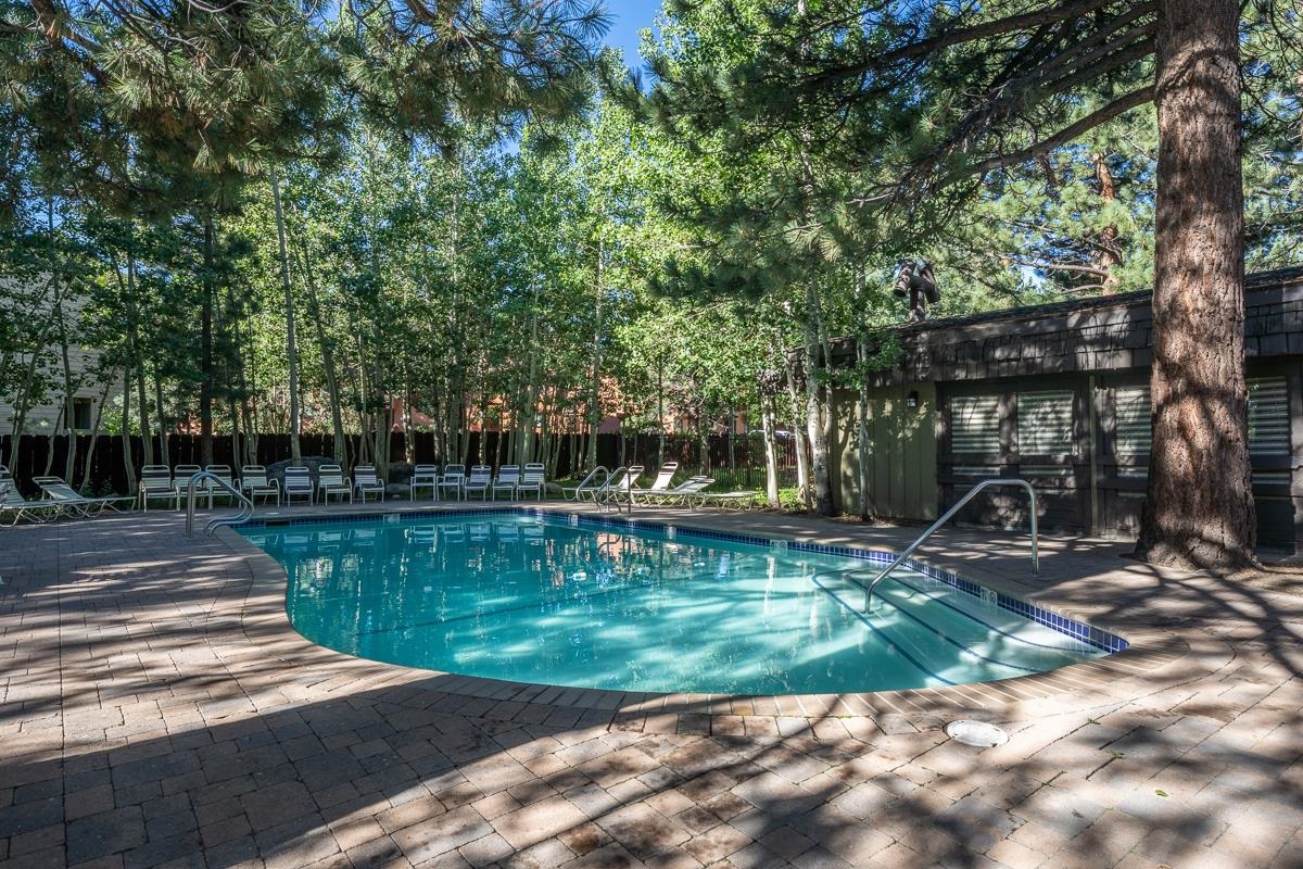 3251 Chateau Road, Unit 38 Mammoth Lakes, CA 93546 - Photo 42 of 50 a view of a swimming pool with sitting area