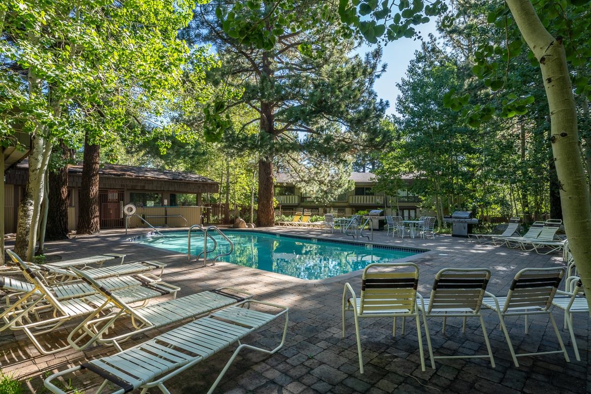 3251 Chateau Road, Unit 38 Mammoth Lakes, CA 93546 - Photo 44 of 50 a view of a backyard with sitting area