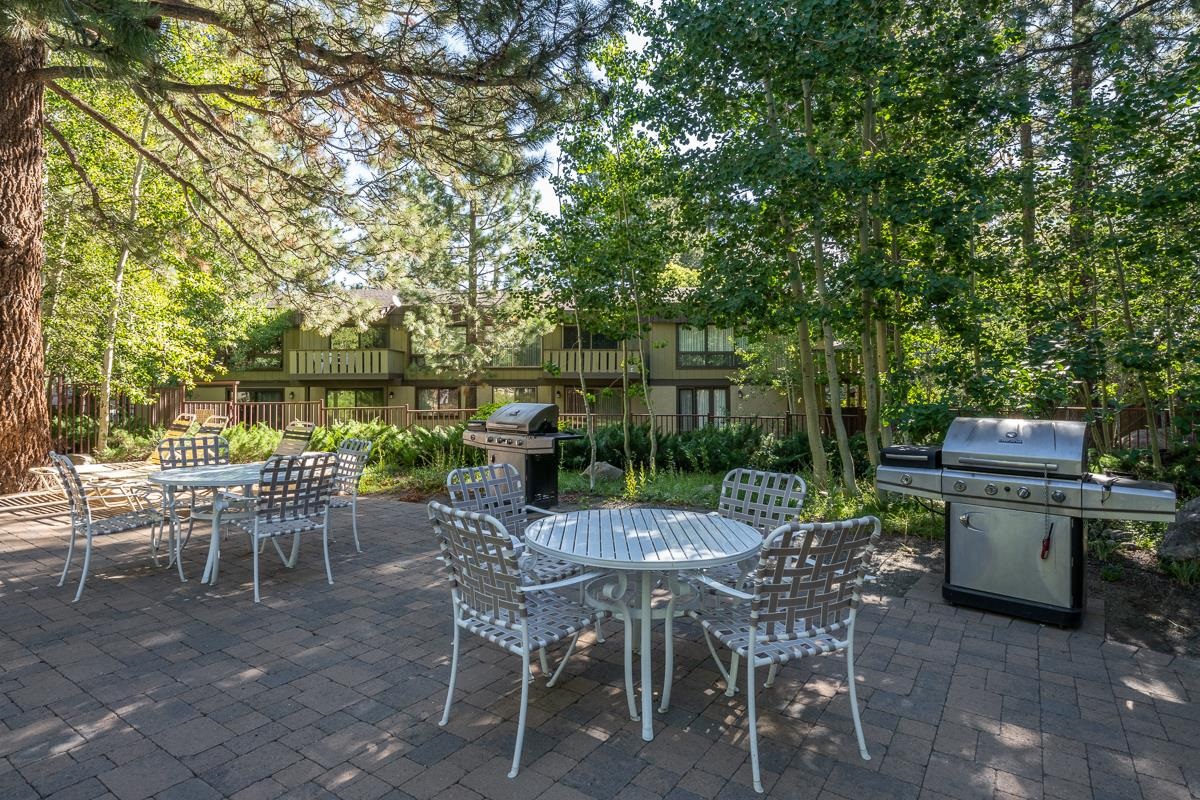3251 Chateau Road, Unit 38 Mammoth Lakes, CA 93546 - Photo 46 of 50 a view of a chairs and table in patio