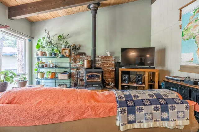 a room with furniture and a flat screen tv