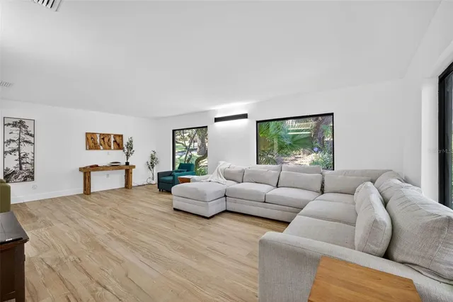 a living room with furniture and window