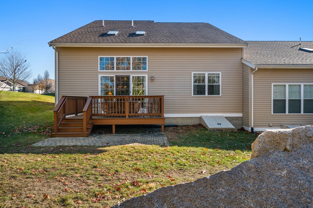 96 Walden Way, Unit 52 Milford, MA 01757 - Photo 23 of 23 a front view of a house with garden