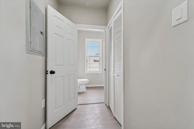 a bathroom with white walls