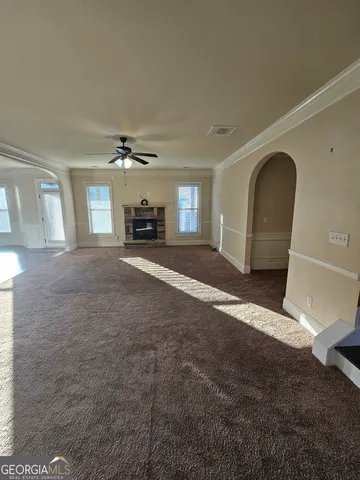 a view of a livingroom with a fireplace