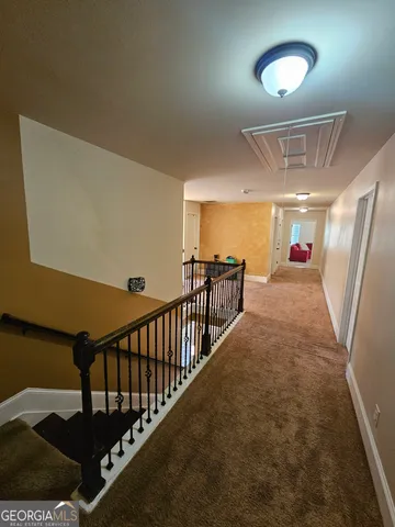 a view of a livingroom with a furniture