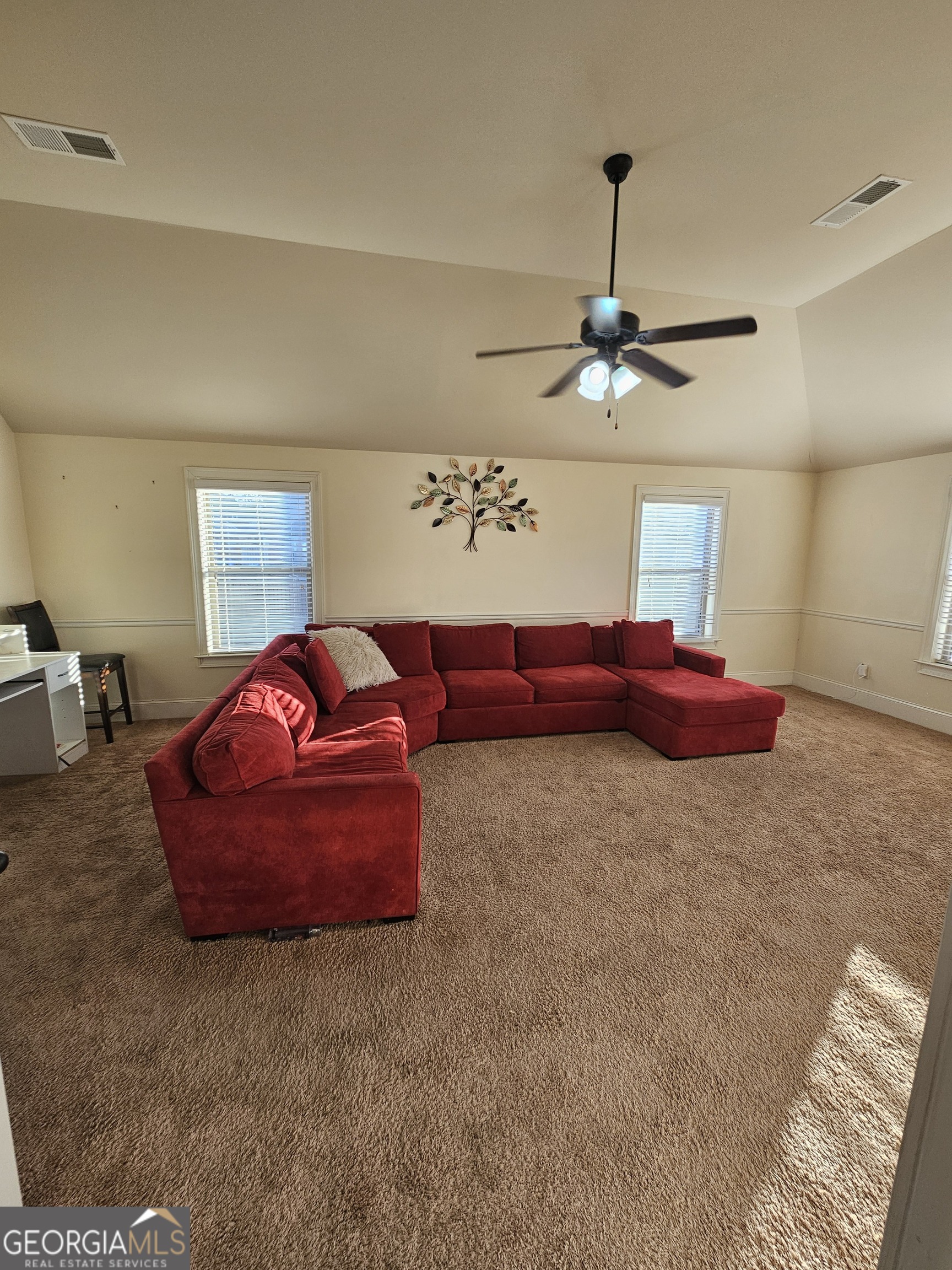 3906 Rosebay Way Southwest Conyers, GA 30094 - Photo 24 of 38 a bedroom with a bed and window