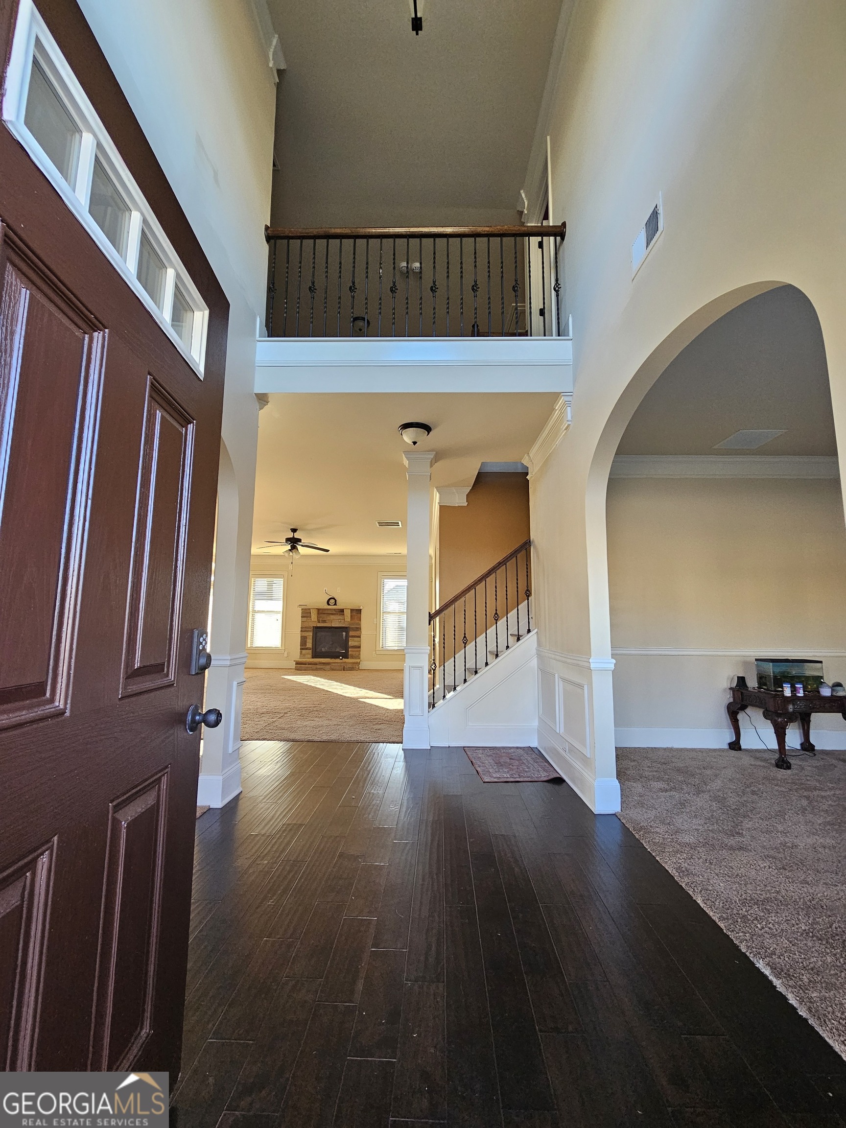 3906 Rosebay Way Southwest Conyers, GA 30094 - Photo 10 of 38 a view of entryway and hall with wooden floor