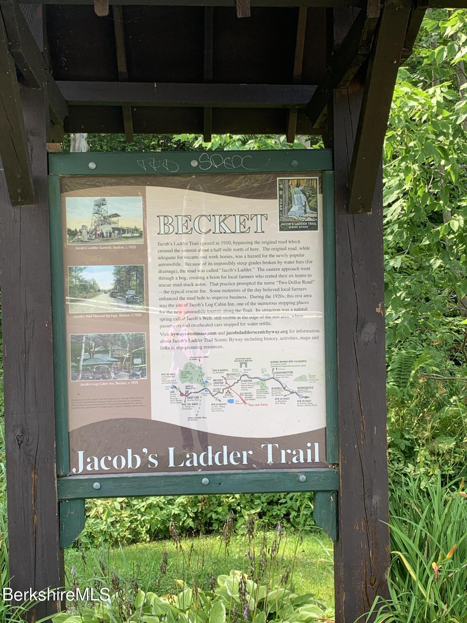 878 Jacobs Ladder Road Becket, MA 01223 - Photo 5 of 5 a sign that is on the side of a building