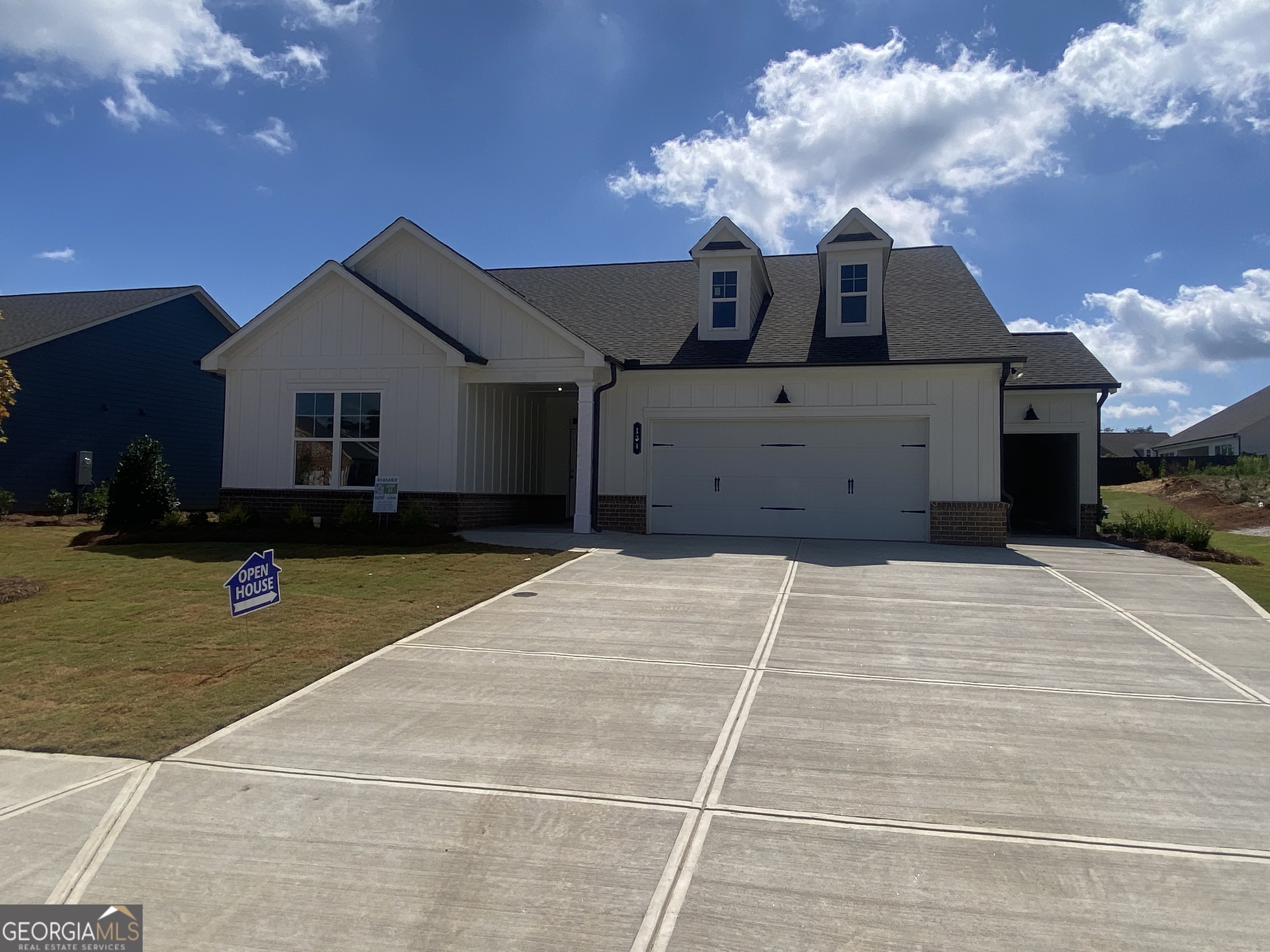 134 Oakdale Road, Unit 31 Jefferson, GA 30549 - Photo 3 of 60 a view of a house with a backyard