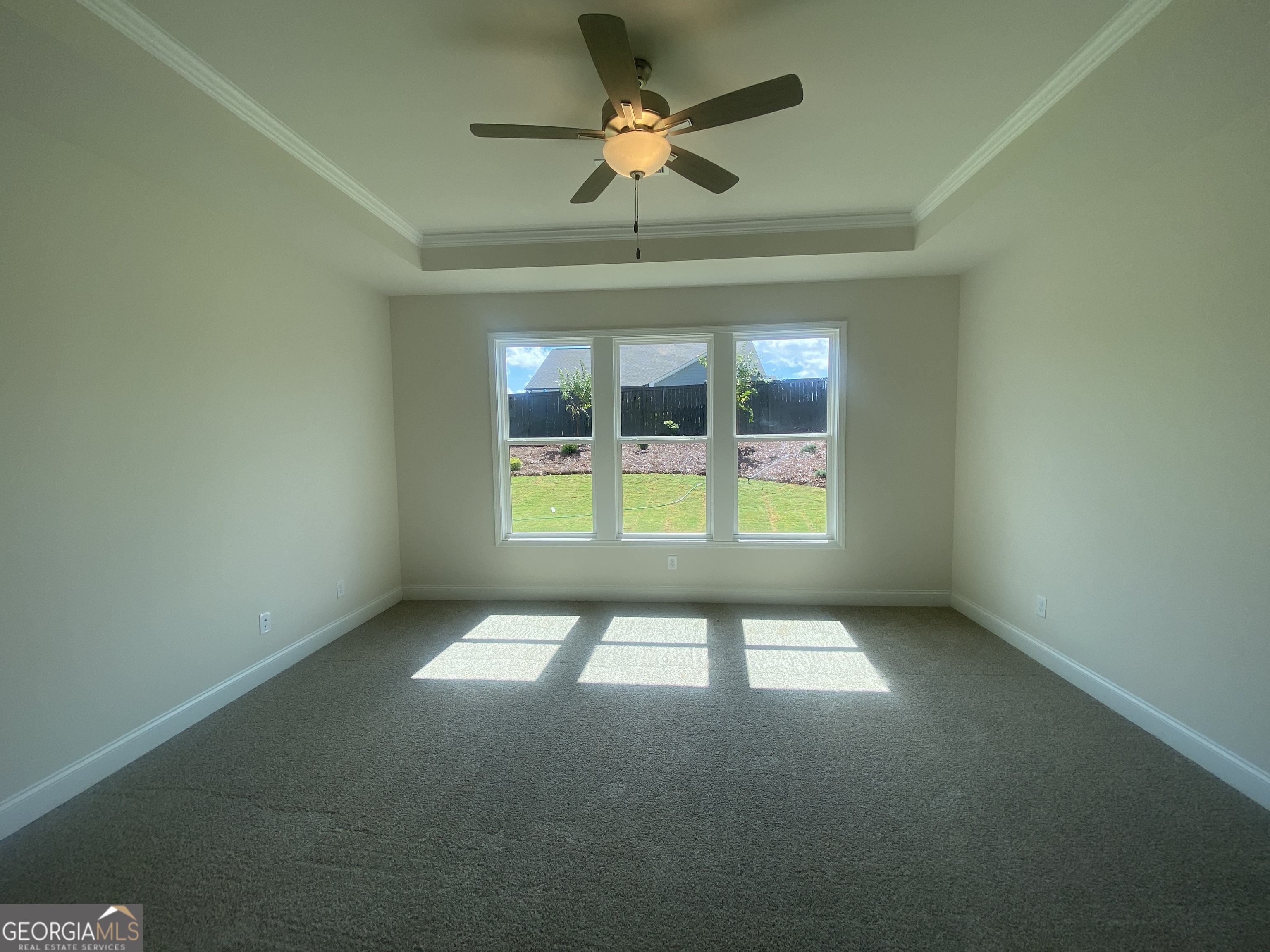 134 Oakdale Road, Unit 31 Jefferson, GA 30549 - Photo 31 of 60 a view of an empty room with a window