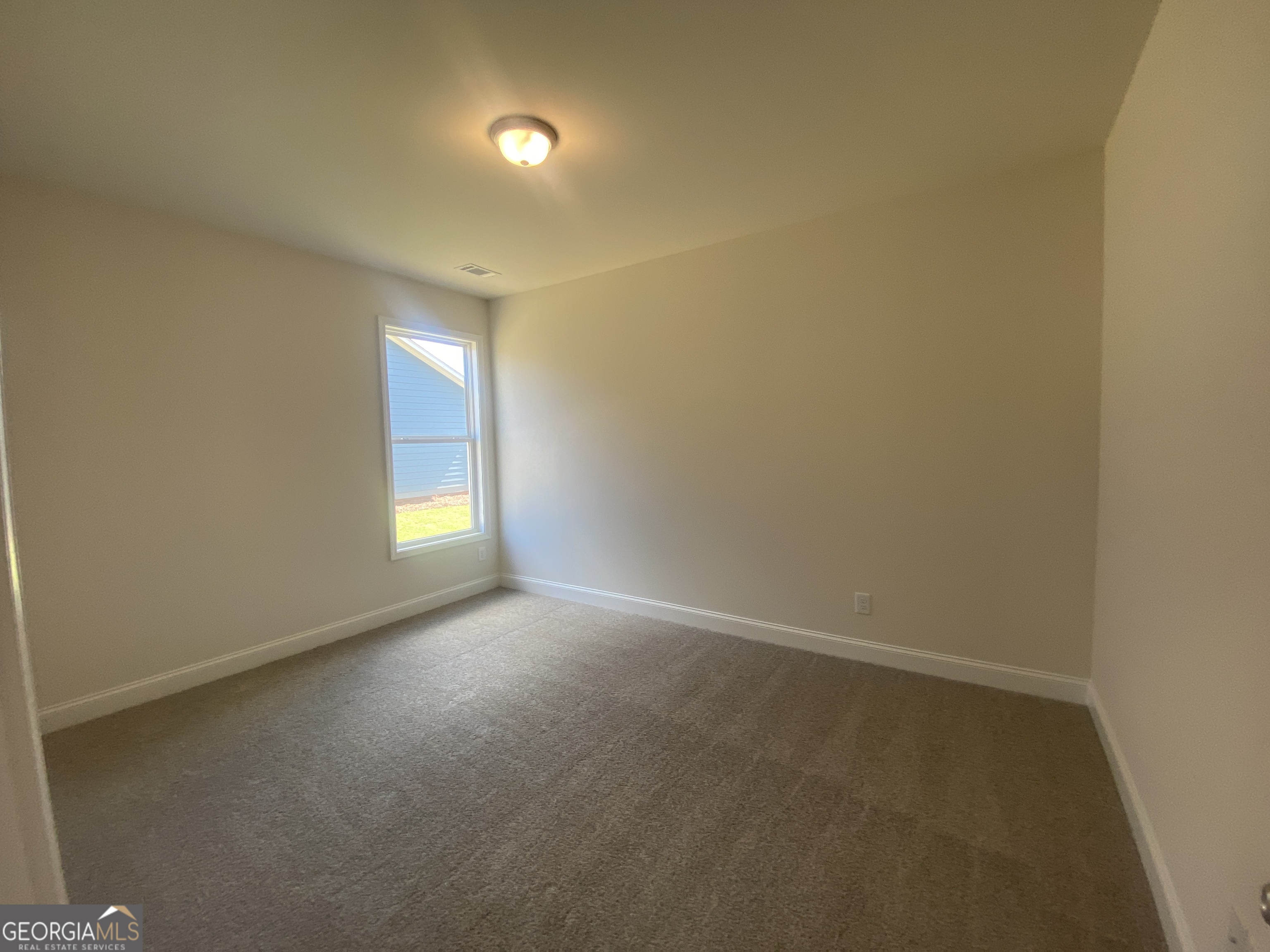 134 Oakdale Road, Unit 31 Jefferson, GA 30549 - Photo 7 of 60 a view of empty room