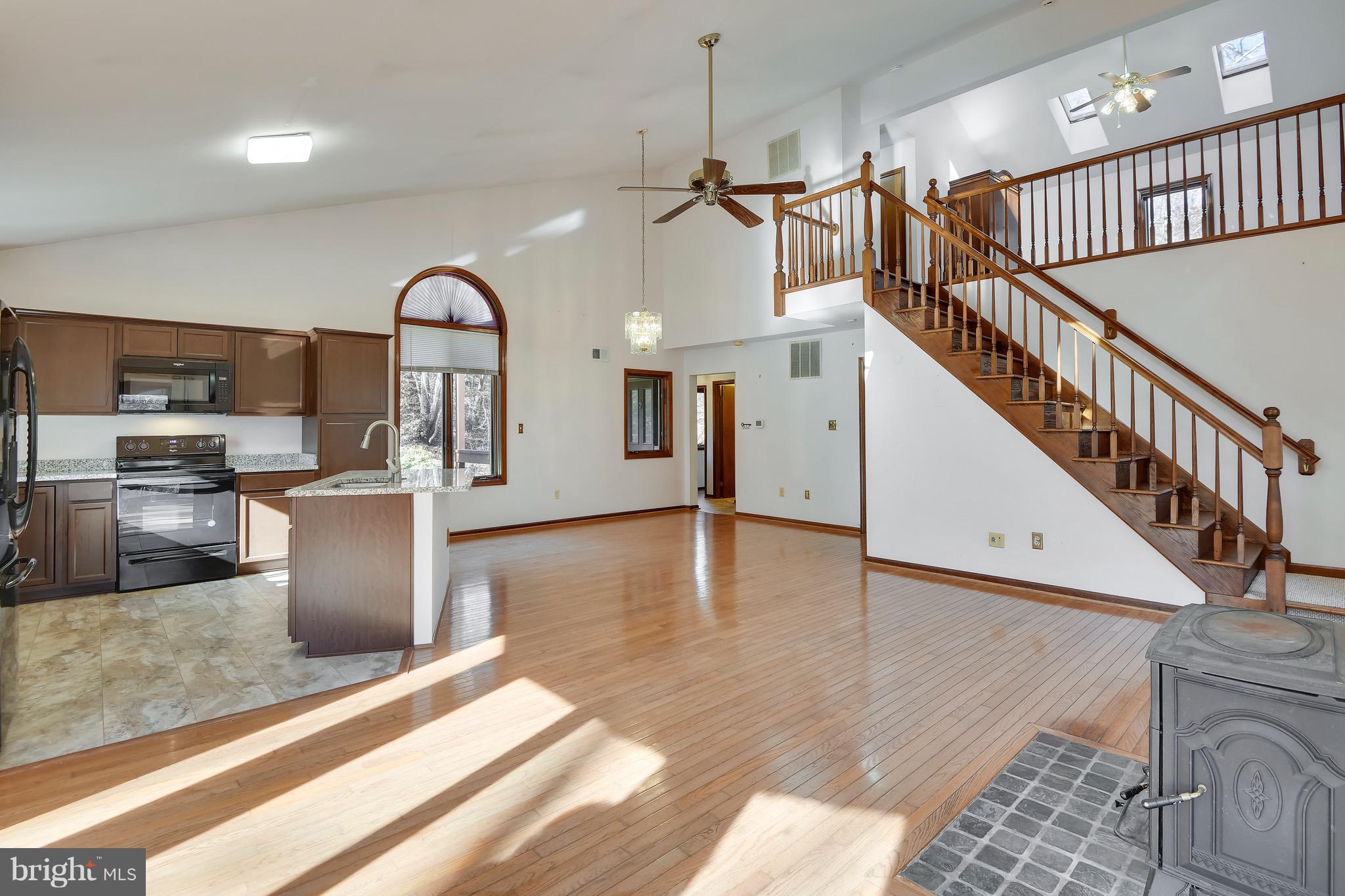 460 Farmington Road West Accokeek, MD 20607 - Photo 13 of 34 a view of entryway and kitchen with wooden floor