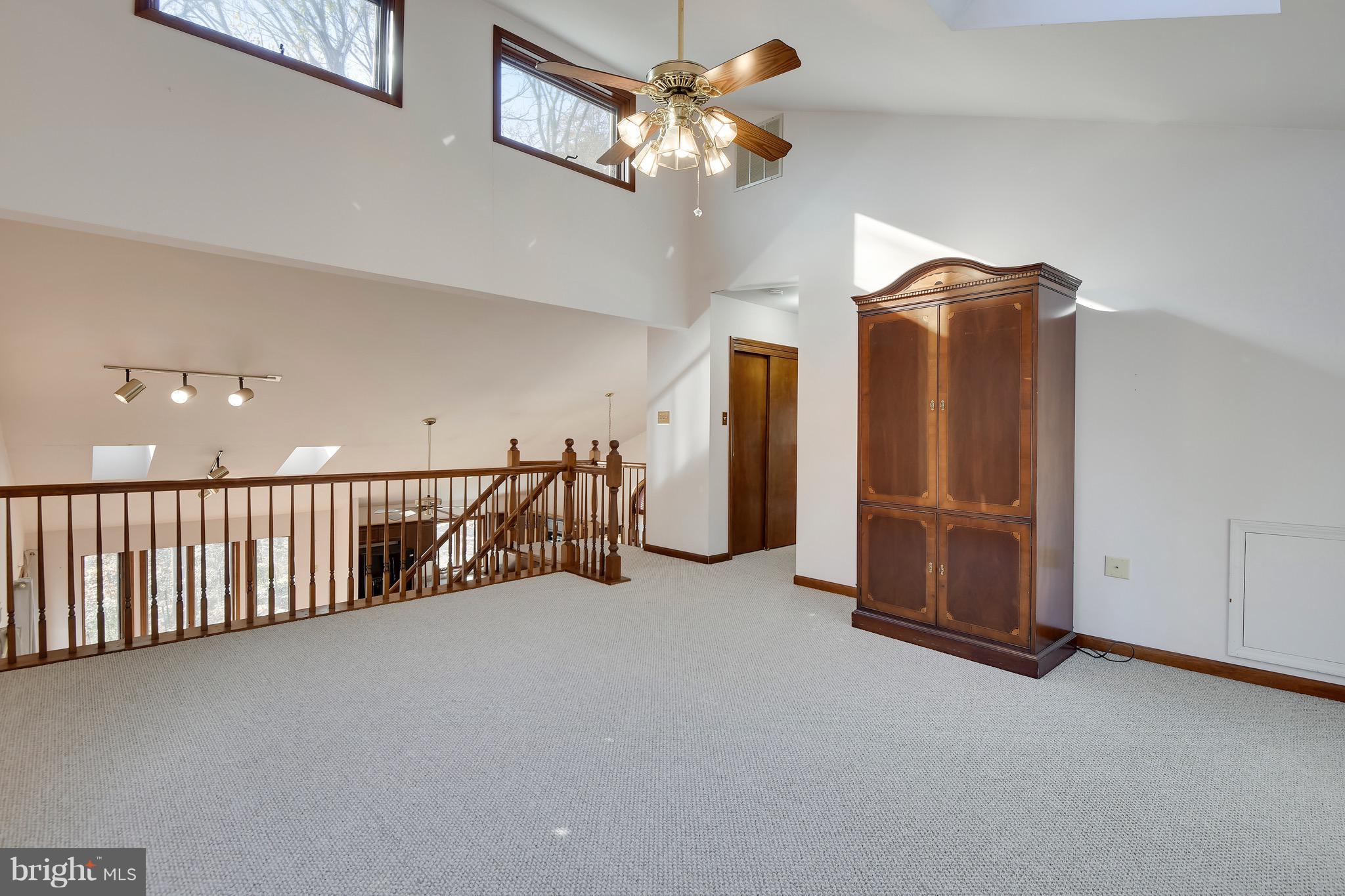 460 Farmington Road West Accokeek, MD 20607 - Photo 25 of 34 a view of a livingroom with a ceiling fan and a window