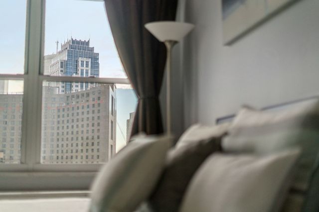 a view of balcony with furniture