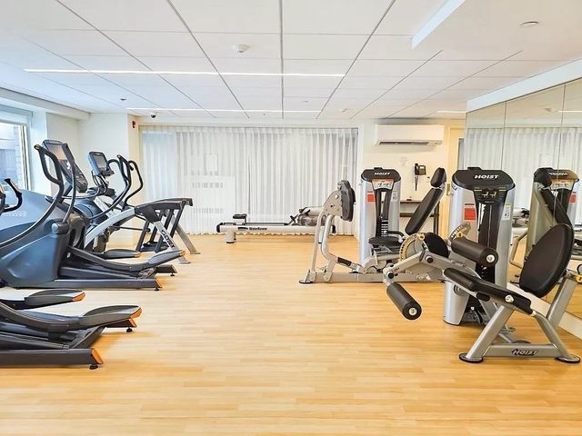 a view of a room with gym equipment