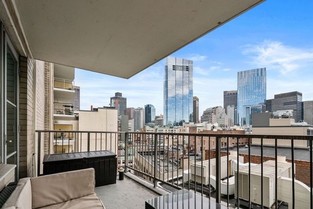 a view of a balcony with city view