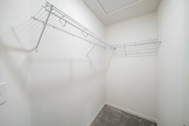 a view of a room with racks on the wall