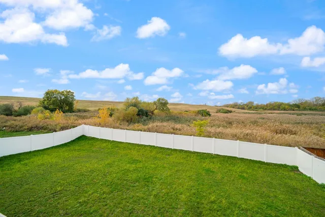 a view of an lake and a yard