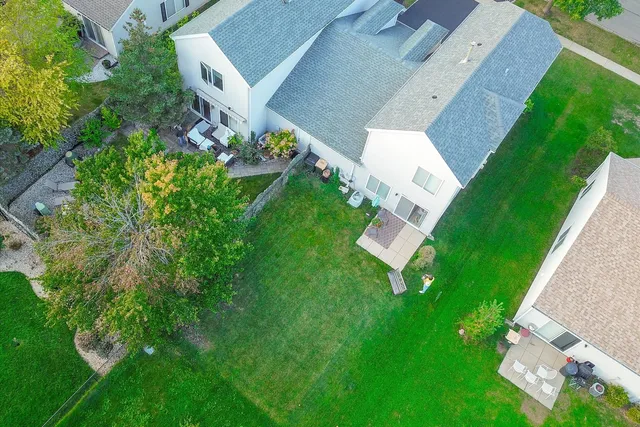an aerial view of a house with a garden