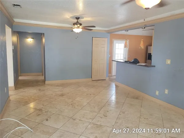 a view of livingroom with kitchen