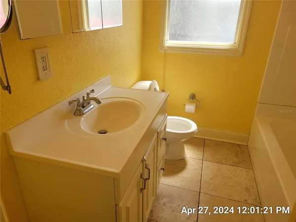 a bathroom with a sink and a vanity