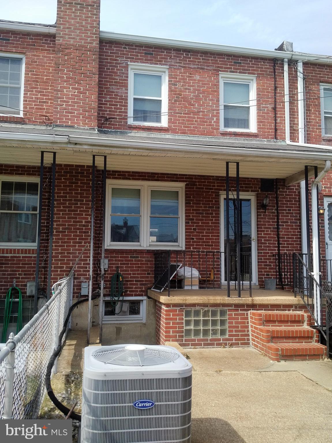 6909 Broening Road Baltimore, MD 21222 - Photo 11 of 13 All-Brick Home - Rear fenced view